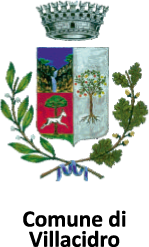 Stemma comunale con corona, rami di alloro e quercia, e scudi con alberi.